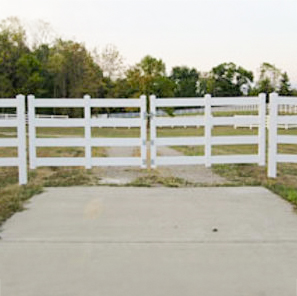 A photo featuring a double gate in white.
