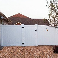 A large privacy fence gate.