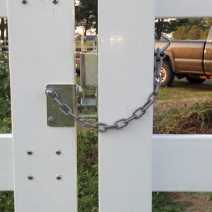 A safety chain on a fence.